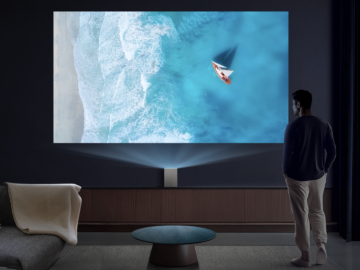 LG projector with a person watching TV.