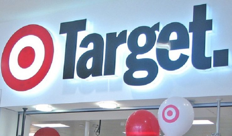 Decisions: Revellers at the Target expansion launch ask themselves if taking an iced-drink into the new store would breach OHS standards.